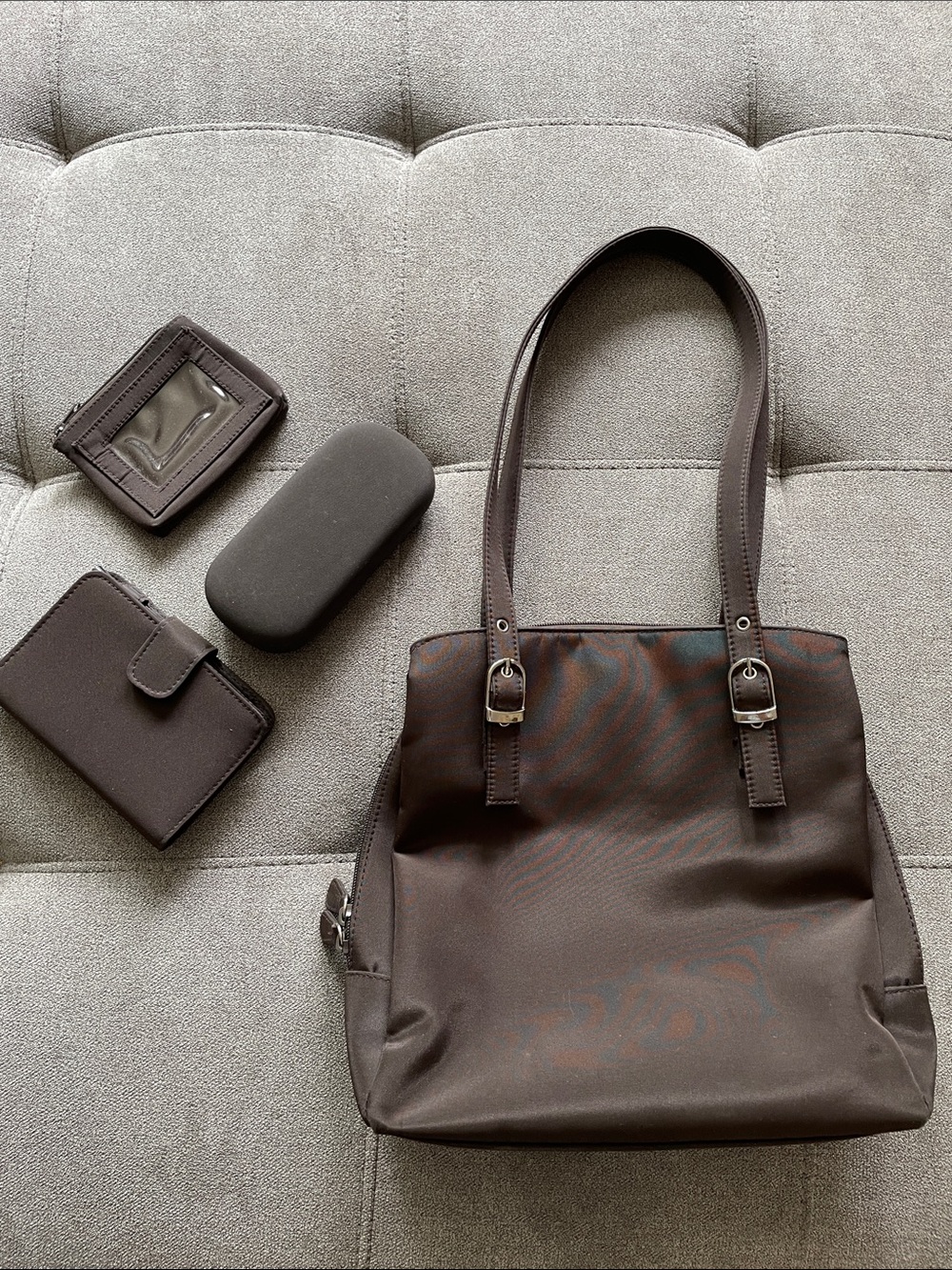 Brown 3 compartment shoulder bag with accessories.